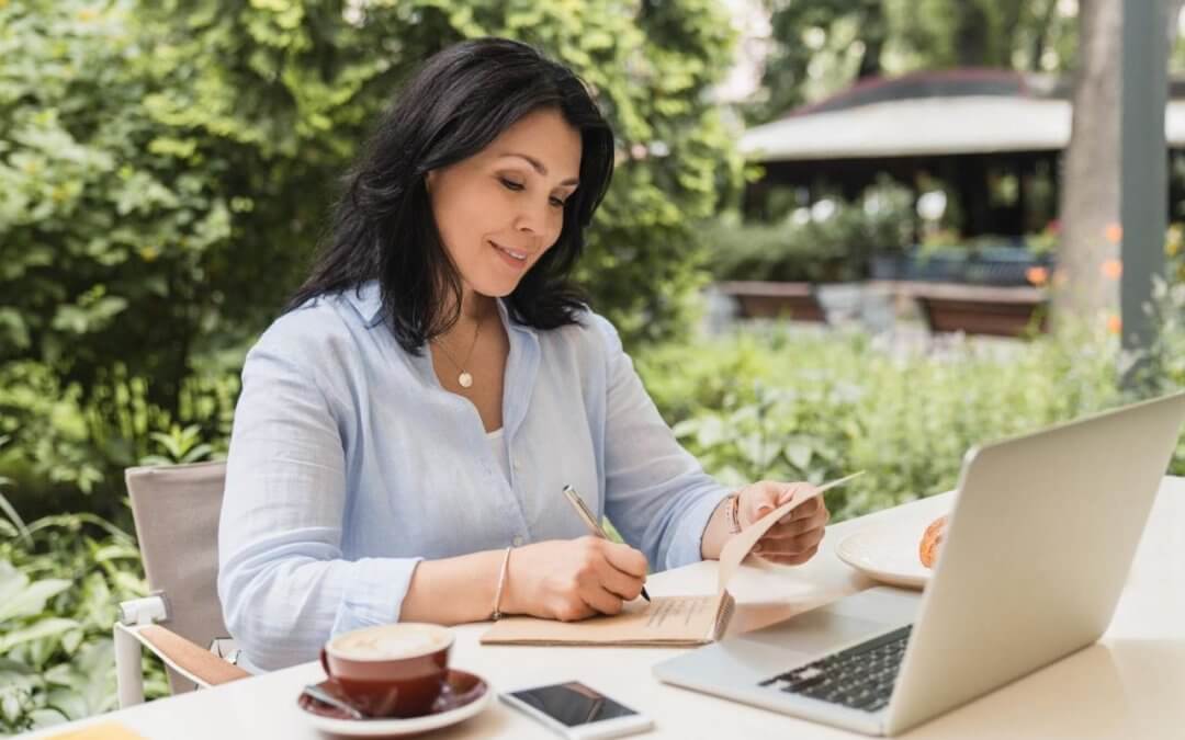 Author writing a book.