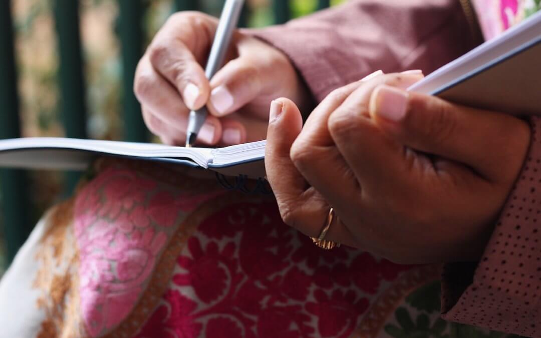 Author writing a book about herself.