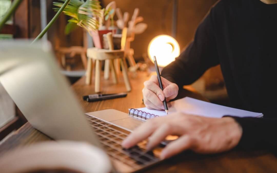 Author using a online writing tool to write a book.